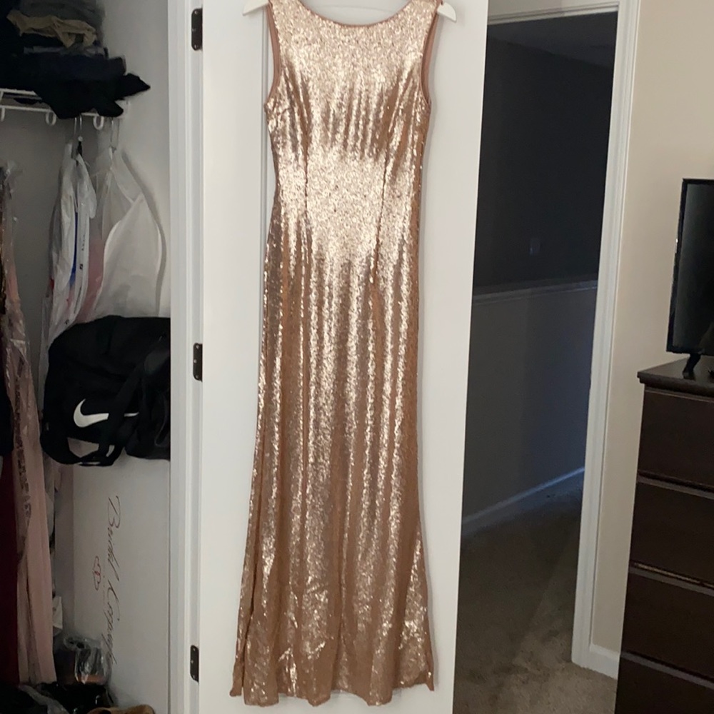 Rose gold sequin maxi dress.